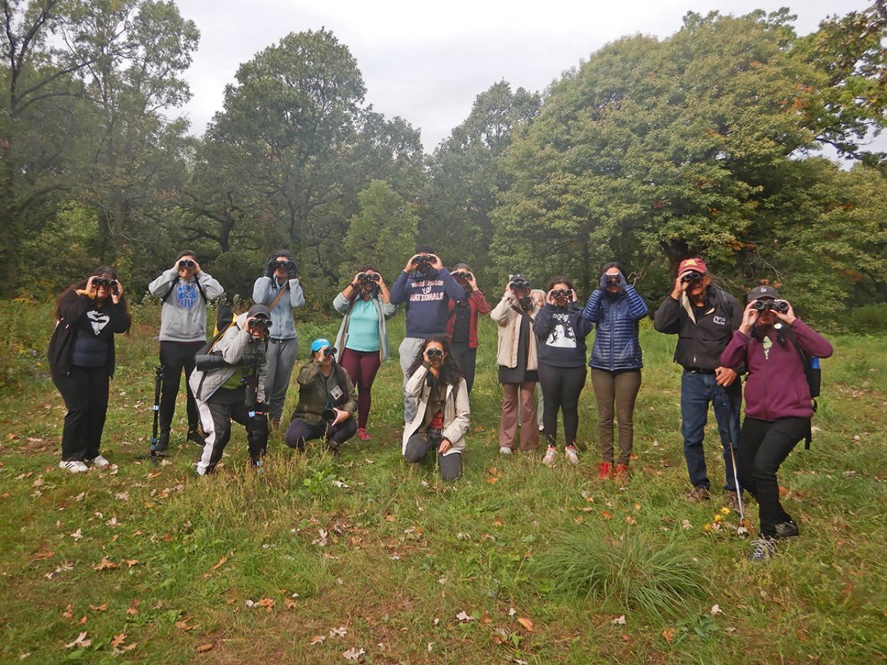 BIPOC birding event People with binoculars outdoors