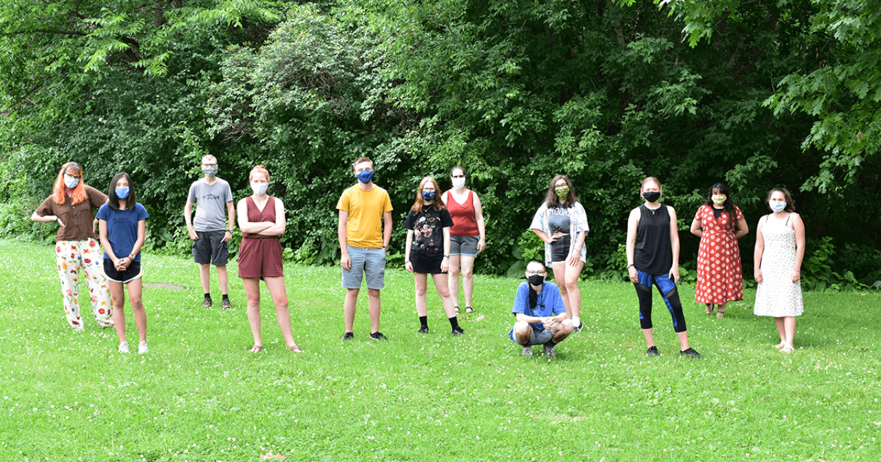 YEP group photo Program participants stand in grass