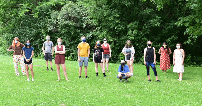 YEP group photo Program participants stand in grass